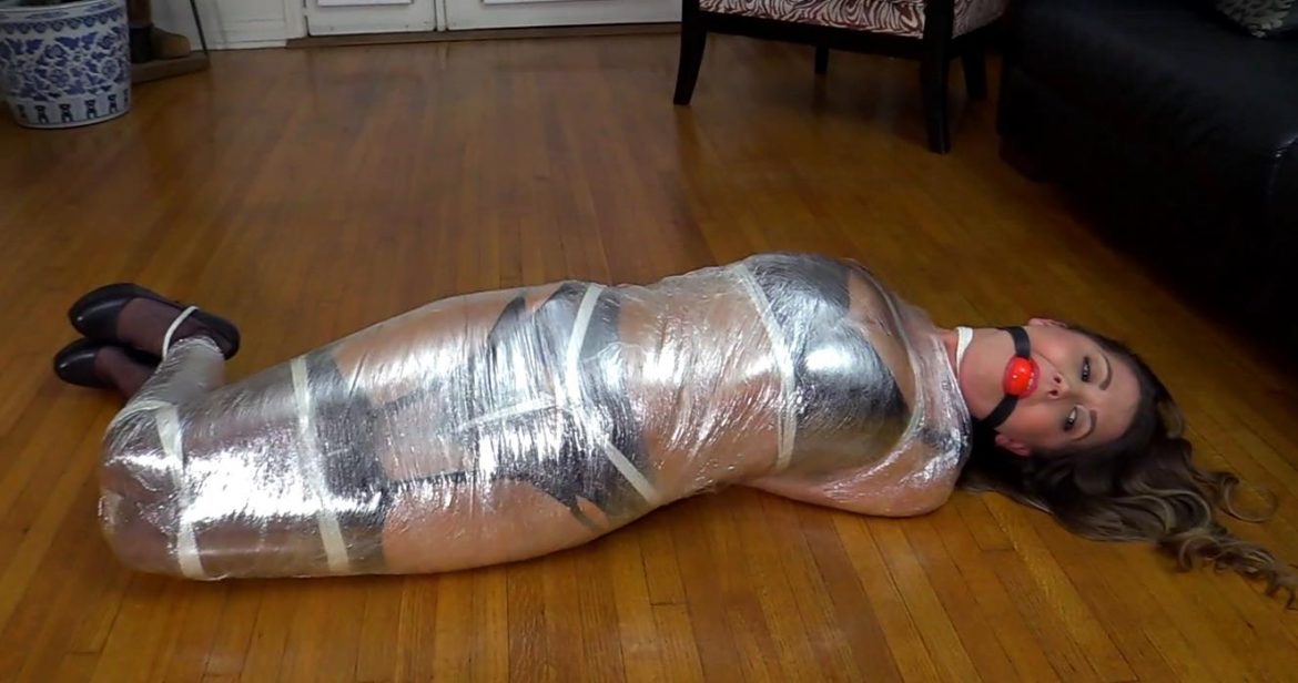 Captive Chrissy Marie tightly bound with rope - Mummification Bondage – The Housewarming Gift