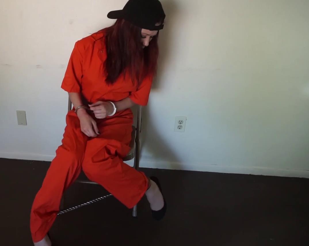 Handcuffs Bondage - Arrested Lily in prison in her jumpsuit and a belt - Lily is handcuffed and shackled