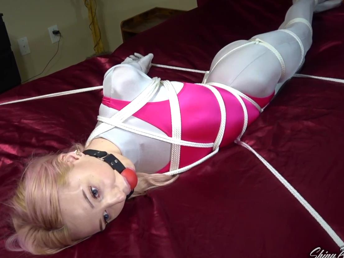 Harper is bound and pulled from every angle - Harper Ballgagged and Bed Bound in Spandex